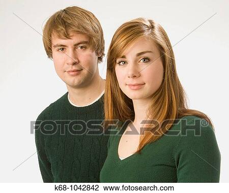 young couple in studio portrait View Large Photo Image Stock Image - young couple in studio portrait. Fotosearch