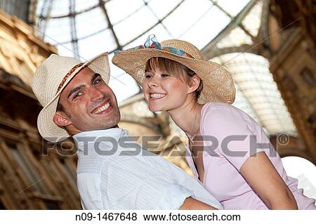 young couple in the gallery in Milan. View Large Photo Image Stock Photo - young couple in the gallery in Milan.. Fotosearch