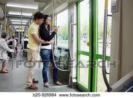 Young couple in tram, Vitoria, Alava, Basque Country, Spain View Large Photo Image Picture - Young couple in tram, Vitoria, Alava, Basque Country, Spain. Fotosearch