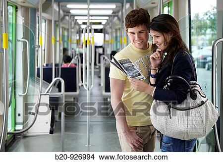 Young couple in tram, Vitoria, Alava, Basque Country, Spain View Large Photo Image Picture - Young couple in tram, Vitoria, Alava, Basque Country, Spain. Fotosearch