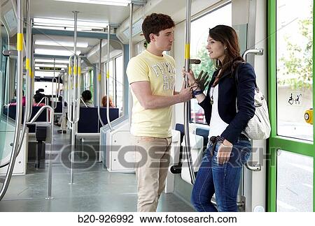 Young couple in tram, Vitoria, Alava, Basque Country, Spain View Large Photo Image Stock Image - Young couple in tram, Vitoria, Alava, Basque Country, Spain. Fotosearch