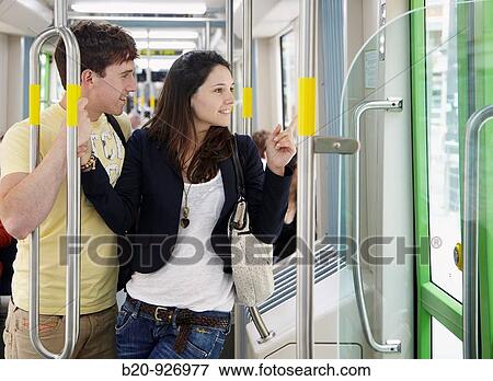 Young couple in tram, Vitoria, Alava, Basque Country, Spain View Large Photo Image Stock Photo - Young couple in tram, Vitoria, Alava, Basque Country, Spain. Fotosearch