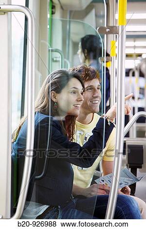 Young couple in tram, Vitoria, Alava, Basque Country, Spain View Large Photo Image Stock Photo - Young couple in tram, Vitoria, Alava, Basque Country, Spain. Fotosearch