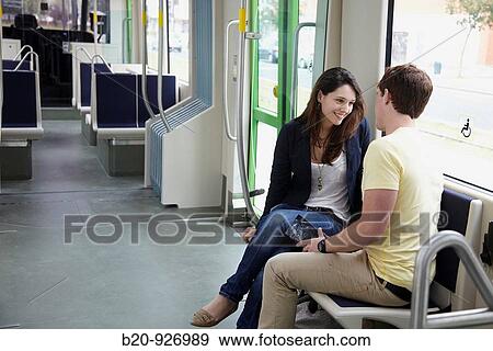 Young couple in tram, Vitoria, Alava, Basque Country, Spain View Large Photo Image Stock Photo - Young couple in tram, Vitoria, Alava, Basque Country, Spain. Fotosearch