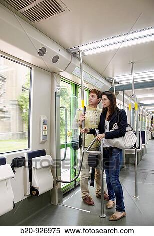Young couple in tram, Vitoria, Alava, Basque Country, Spain View Large Photo Image Stock Photography - Young couple in tram, Vitoria, Alava, Basque Country, Spain. Fotosearch