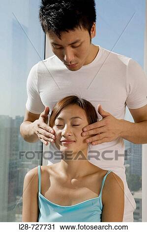 Young Couple massage View Large Photo Image Stock Image - Young Couple massage. Fotosearch
