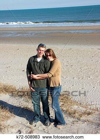 Young Couple on Beach in North Carolina, USA View Large Photo Image Stock Image - Young Couple on Beach in North Carolina, USA. Fotosearch