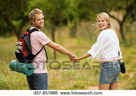 Young couple on country holidays View Large Photo Image Stock Photograph - Young couple on country holidays. Fotosearch