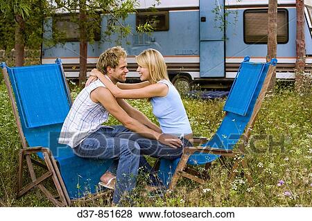 Young couple outdoors casual View Large Photo Image Stock Photo - Young couple outdoors casual. Fotosearch