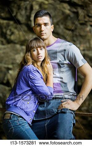 Young couple posing together View Large Photo Image Stock Image - Young couple posing together. Fotosearch