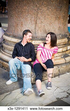 Young couple relaxing outside Roman Pantheon in Rome, Italy View Large Photo Image Stock Image - Young couple relaxing outside Roman Pantheon in Rome, Italy. Fotosearch