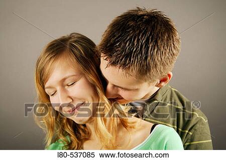 Young couple sharing an intimate moment View Large Photo Image Stock Photography - Young couple sharing an intimate moment. Fotosearch