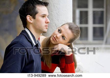 Young couple, she is in love, he is ignorant View Large Photo Image Stock Photo - Young couple, she is in love, he is ignorant. Fotosearch