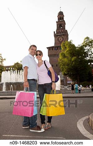 young couple shopping in Milan View Large Photo Image Stock Image - young couple shopping in Milan. Fotosearch