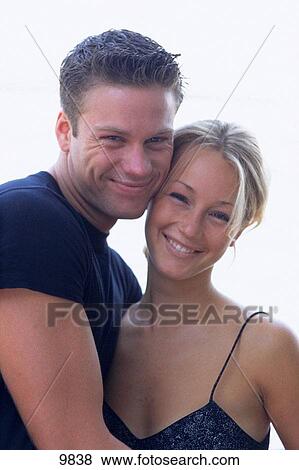 Stock Photo - Young couple smiling. Fotosearch