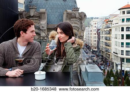 Young couple visiting the city, Alhondiga building, leisure and culture center, Bilbao, Bizkaia, Basque Country, Spain View Large Photo Image Stock Photo - Young couple visiting the city, Alhondiga building, leisure and culture center, Bilbao, Bizkaia, Basque Country, Spain. Fotosearch