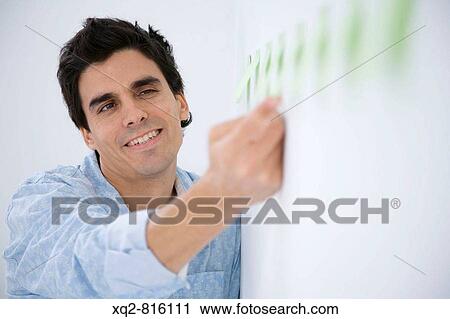 Young creative at office View Large Photo Image Stock Image - Young creative at office. Fotosearch