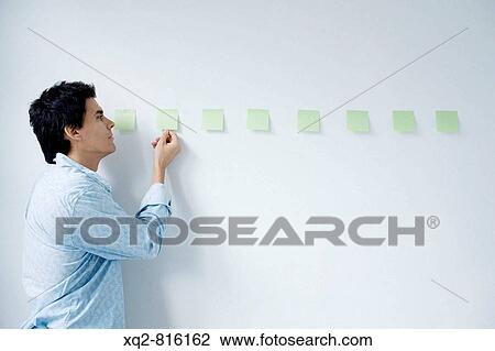 Young creative working with ideas View Large Photo Image Stock Image - Young creative working with ideas. Fotosearch