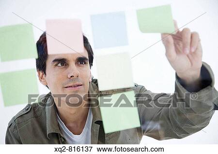 Young creative working with ideas View Large Photo Image Stock Photo - Young creative working with ideas. Fotosearch