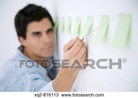 Stock Image - young creative wrking with ideas. Fotosearch