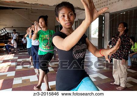 Stock Photograph - Young dancers practice traditional Cambodian dance which they perform at the National Museum in Phnom Penh, Cambodia.. Fotosearch