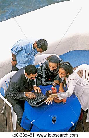 Young employees in open air meeting, Curacao, Netherlands Antilles View Large Photo Image Stock Image - Young employees in open air meeting, Curacao, Netherlands Antilles. Fotosearch