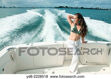 Young enjoying a Quinceaera cruising along the coast of Miami, Florida, USA View Large Photo Image Stock Photo - Young enjoying a Quinceaera cruising along the coast of Miami, Florida, USA. Fotosearch