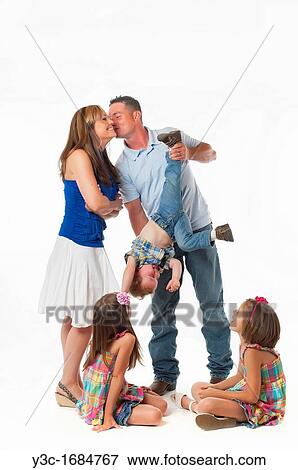 Stock Photo - Young family portrait. Fotosearch