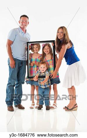 Stock Photograph - Young family portrait. Fotosearch