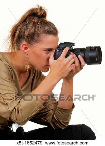 young Fashionable woman with camera View Large Photo Image Stock Photo - young Fashionable woman with camera. Fotosearch