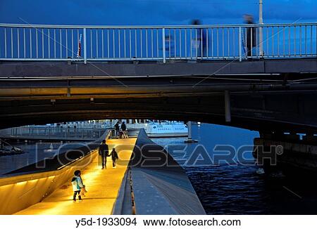 young father with children walking under Mt Blanc bridge on Rhone river, people walking on the bridge, Geneva at dusk, Switzerland View Large Photo Image Picture - young father with children walking under Mt Blanc bridge on Rhone river, people walking on the bridge, Geneva at dusk, Switzerland. Fotosearch