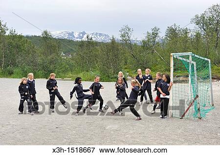 young female football players, Tromso, County of Troms, Norway, Northern Europe View Large Photo Image Stock Photo - young female football players, Tromso, County of Troms, Norway, Northern Europe. Fotosearch