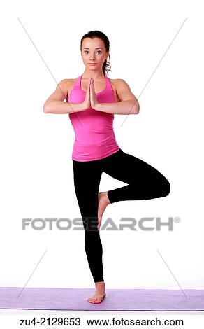 Young female model performing yoga asanas. View Large Photo Image Stock Image - Young female model performing yoga asanas.. Fotosearch