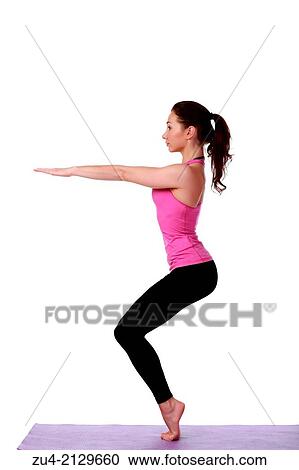 Young female model performing yoga asanas. View Large Photo Image Stock Image - Young female model performing yoga asanas.. Fotosearch