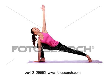 Young female model performing yoga asanas. View Large Photo Image Stock Image - Young female model performing yoga asanas.. Fotosearch