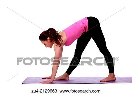 Young female model performing yoga asanas. View Large Photo Image Stock Image - Young female model performing yoga asanas.. Fotosearch