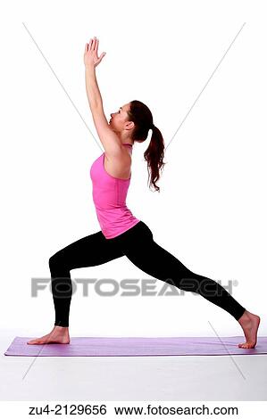 Young female model performing yoga asanas. View Large Photo Image Stock Photograph - Young female model performing yoga asanas.. Fotosearch