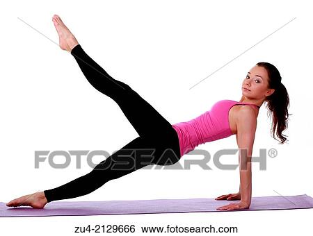 Young female model performing yoga asanas. View Large Photo Image Stock Photograph - Young female model performing yoga asanas.. Fotosearch