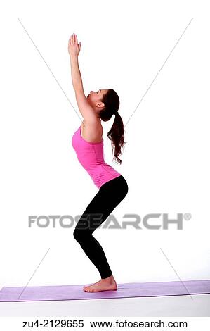 Young female model performing yoga asanas. View Large Photo Image Stock Photography - Young female model performing yoga asanas.. Fotosearch