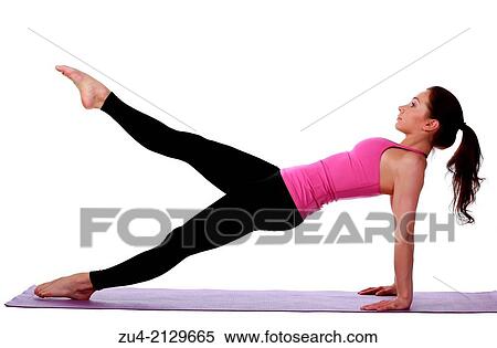 Young female model performing yoga asanas. View Large Photo Image Stock Photography - Young female model performing yoga asanas.. Fotosearch