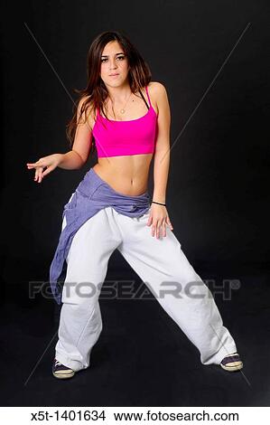 Young female teen of thirteen modern dancer On black Background View Large Photo Image Picture - Young female teen of thirteen modern dancer On black Background. Fotosearch