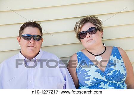 Young gay female couple View Large Photo Image Stock Photo - Young gay female couple. Fotosearch