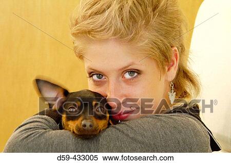 Young girl, 20 years old, with her dog. View Large Photo Image Stock Photography - Young girl, 20 years old, with her dog.. Fotosearch