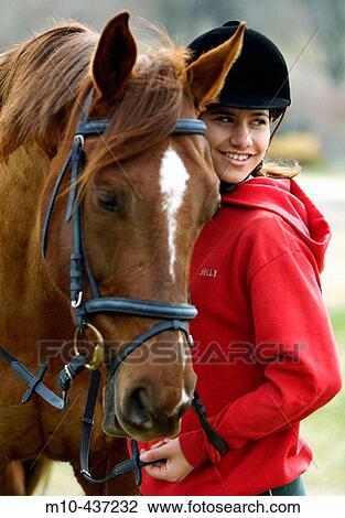 Young Girl and her horse View Large Photo Image Stock Image - Young Girl and her horse. Fotosearch