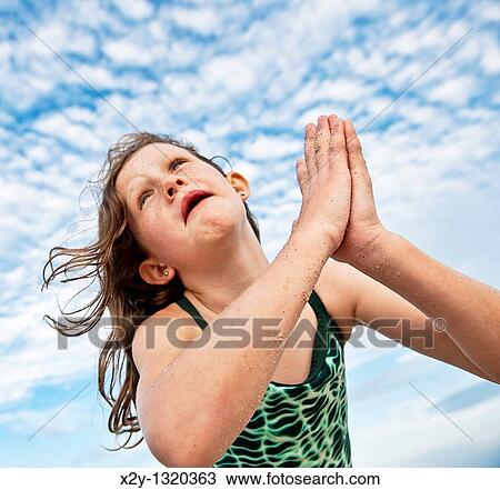 Young girl at the beach View Large Photo Image Stock Image - Young girl at the beach. Fotosearch