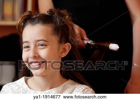 Young girl at the hairdresser, Firenze, Tuscany, Italy View Large Photo Image Stock Photo - Young girl at the hairdresser, Firenze, Tuscany, Italy. Fotosearch