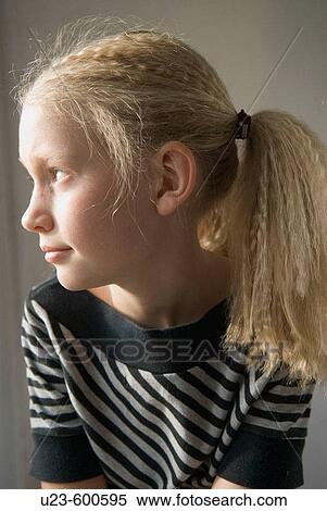 Young girl by the window. View Large Photo Image Stock Photography - Young girl by the window.. Fotosearch