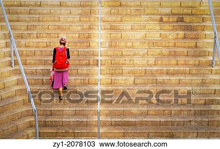 Young girl climbing stairs in Mamilla's new shopping Street Jerusalem View Large Photo Image Stock Image - Young girl climbing stairs in Mamilla's new shopping Street Jerusalem. Fotosearch