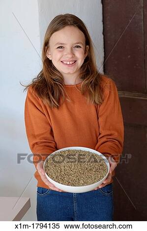 Young girl, food concept View Large Photo Image Stock Photography - Young girl, food concept. Fotosearch