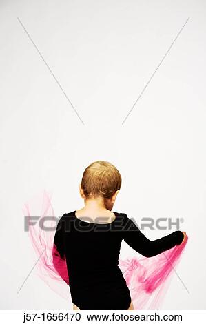 Young girl in a black leotard with pediatric cancer leukimia playing with fabric in the studio View Large Photo Image Stock Image - Young girl in a black leotard with pediatric cancer leukimia playing with fabric in the studio. Fotosearch